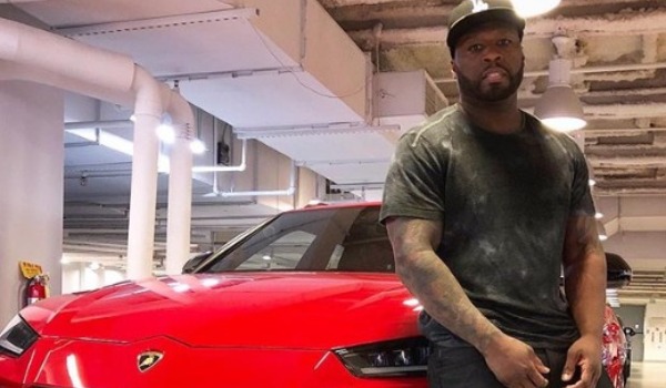 50 Cent's fans come to his defense after people criticize him for posting photos of exotic cars.